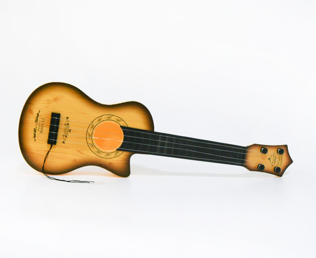 Гитара в чехле 46*15см